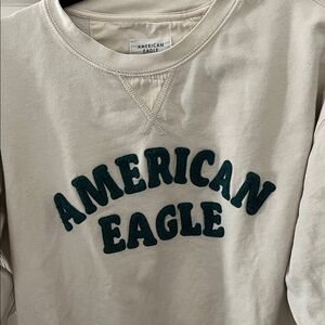 American Eagle Cream Pullover with Green Logo